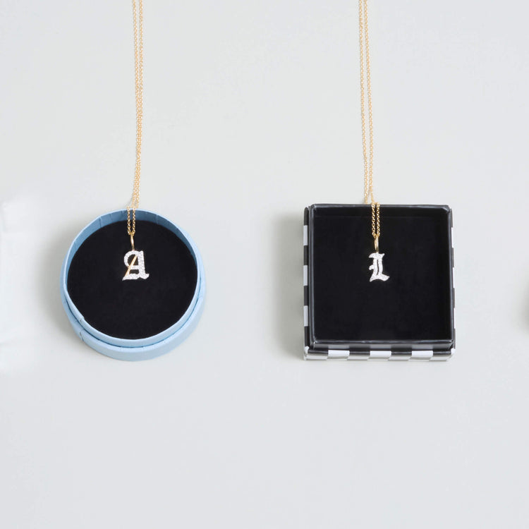 Still life image of Gothic Pave Initial Necklace with Stone and Strand Gift Box