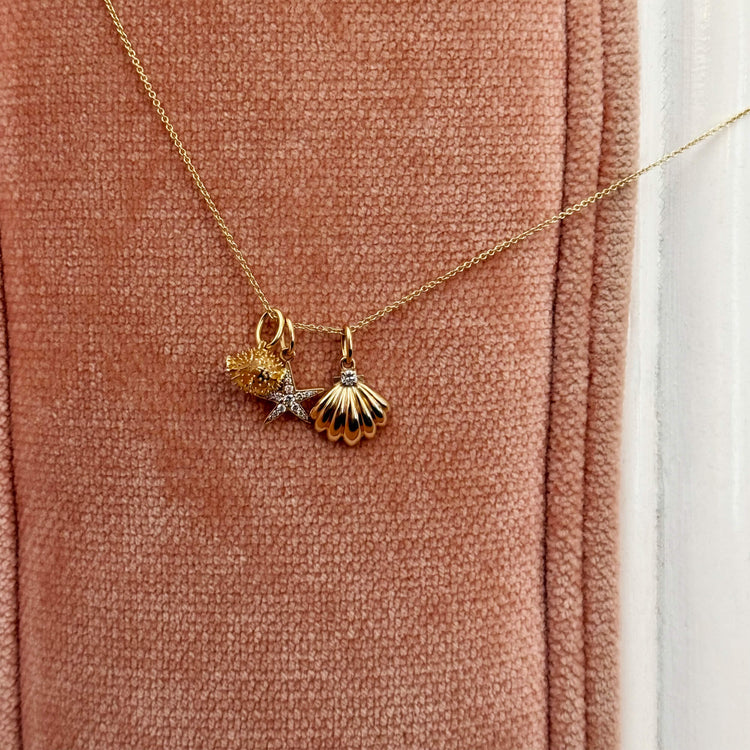 Still life image of LAB-Created Diamond Starfish Necklace with Stone and Strand solid gold jewelry