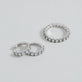 Still life image of Love After Dark LAB-Created Platinum Huggies with Stone and Strand solid gold jewelry
