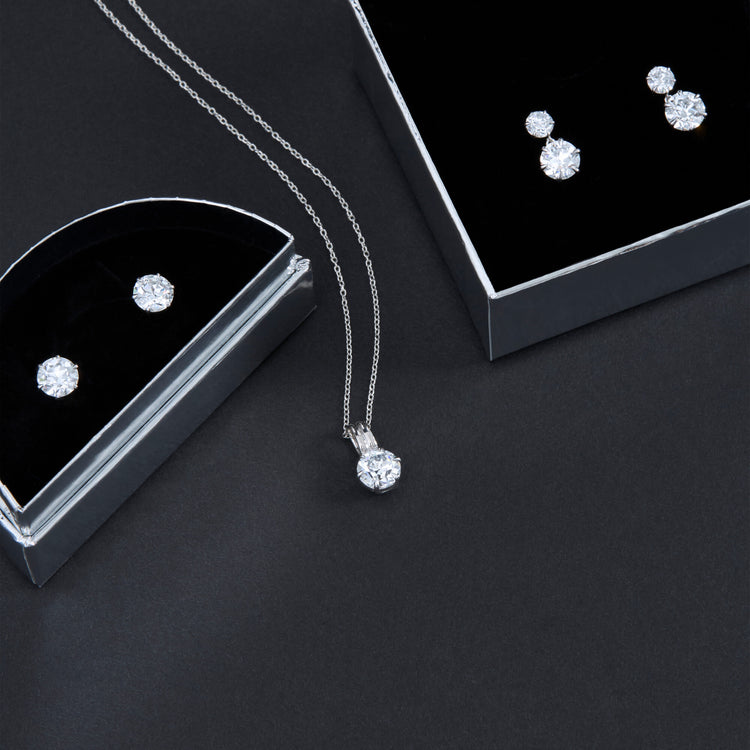 Still life image of LAB-Created Old Mine Cut Platinum Stud Earrings with Stone and Strand solid gold jewelry