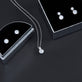 Still life image of LAB-Created Old Mine Cut Platinum Stud Earrings with Stone and Strand solid gold jewelry