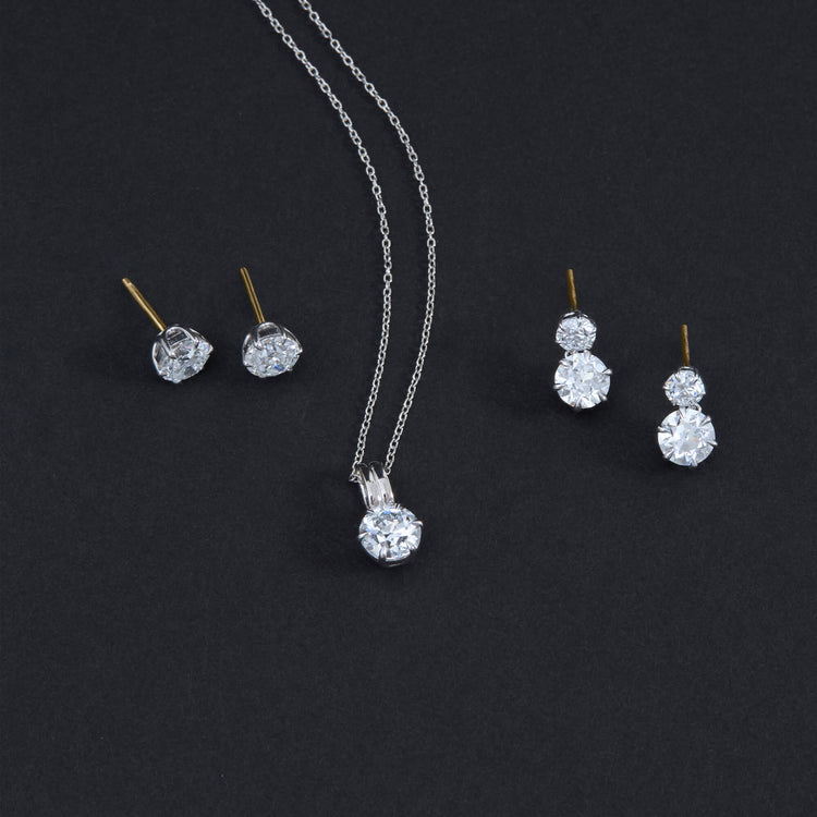 Still life image of LAB-Created Old Mine Cut Platinum Stud Earrings with Stone and Strand solid gold jewelry