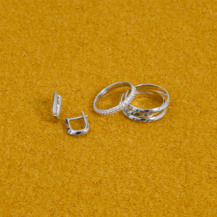 Still life image of Silver Knife Edge Hoop Duo Set with Stone and Strand solid gold jewelry