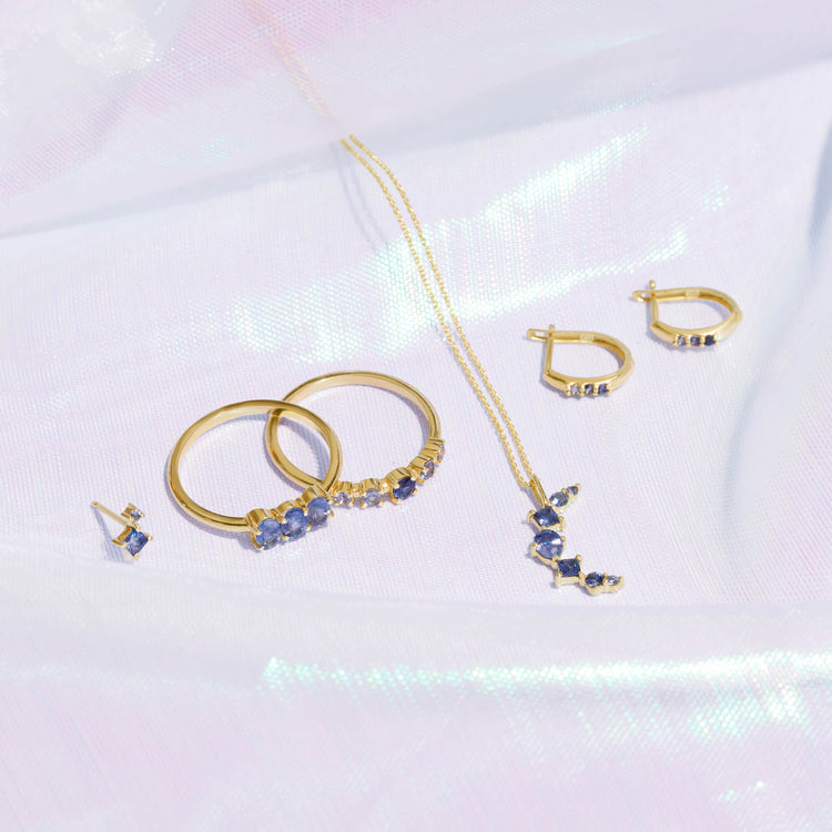 Still life image of Small Le Bleu Double Stud with Stone and Strand solid gold jewelry