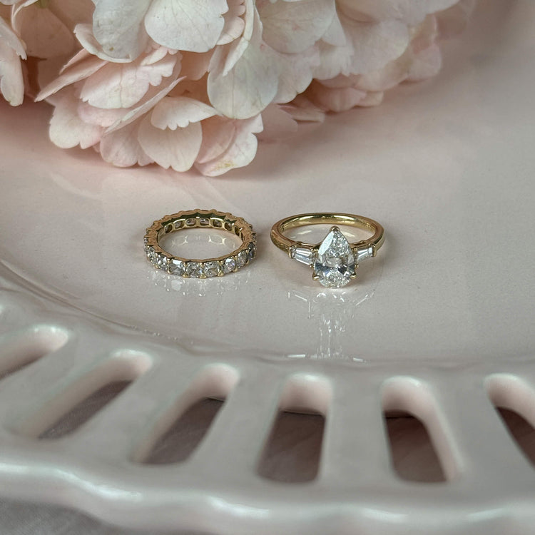 Still life image of LAB-Created Princess Eternity Band with Stone and Strand solid gold jewelry
