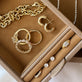 Still life image of LAB-Created Heart Eternity Band with Stone and Strand solid gold jewelry