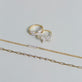 Still life image of Jumbo Butterfly Diamond Ring with Stone and Strand solid gold jewelry