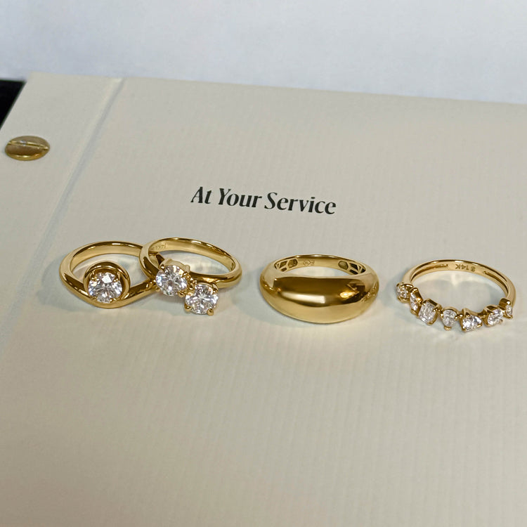 Still life image of Bold Form Ring with Stone and Strand solid gold jewelry