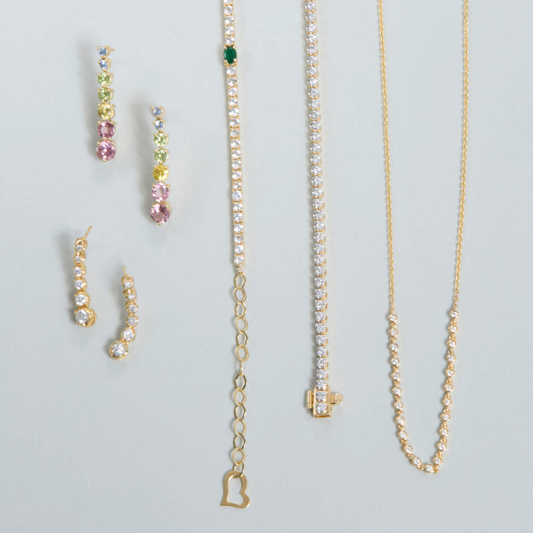 Still life image of Green Goddess Tennis Bracelet with Stone and Strand solid gold jewelry