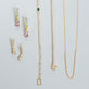 Still life image of Rainbow Bright Drop Earrings with Stone and Strand solid gold jewelry