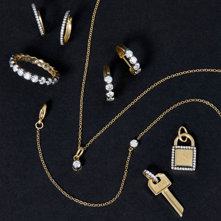 Still life image of Almost Forever Pave Key Charm with Stone and Strand solid gold jewelry