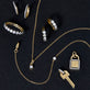 Still life image of Almost Forever Pave Key Charm with Stone and Strand solid gold jewelry