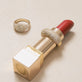 Still life image of The Standard Diamond Signet Ring with Stone and Strand solid gold jewelry