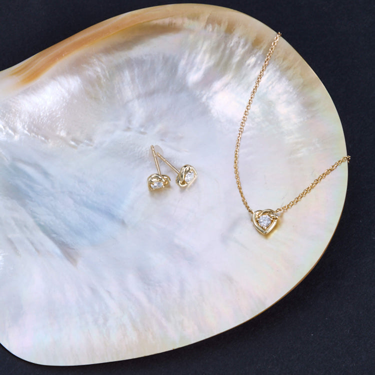 Still life image of Tie The Knot Diamond Necklace with Stone and Strand solid gold jewelry