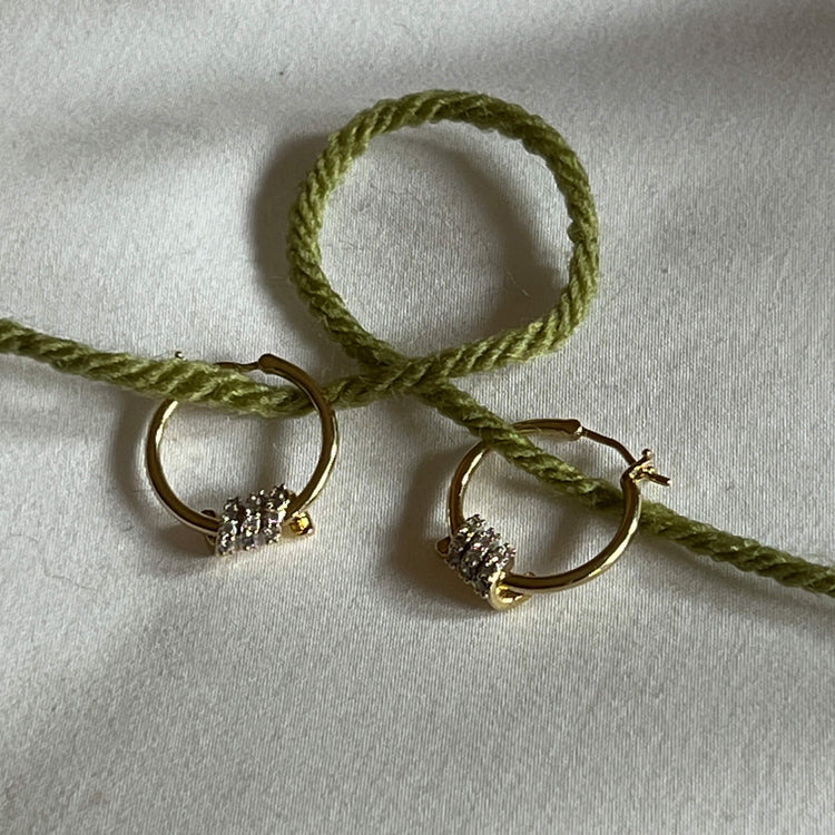 Still life image of Twinkling Twine Pave Hoops