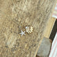 Still life image of Vintage Scallop Shell Necklace with Stone and Strand solid gold jewelry