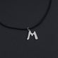 Stone and Strand Sterling Silver XL Silver Blob Initial Necklace Editorial Image