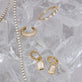 Still life image of Perfect Pear Diamond Band with Stone and Strand solid gold jewelry