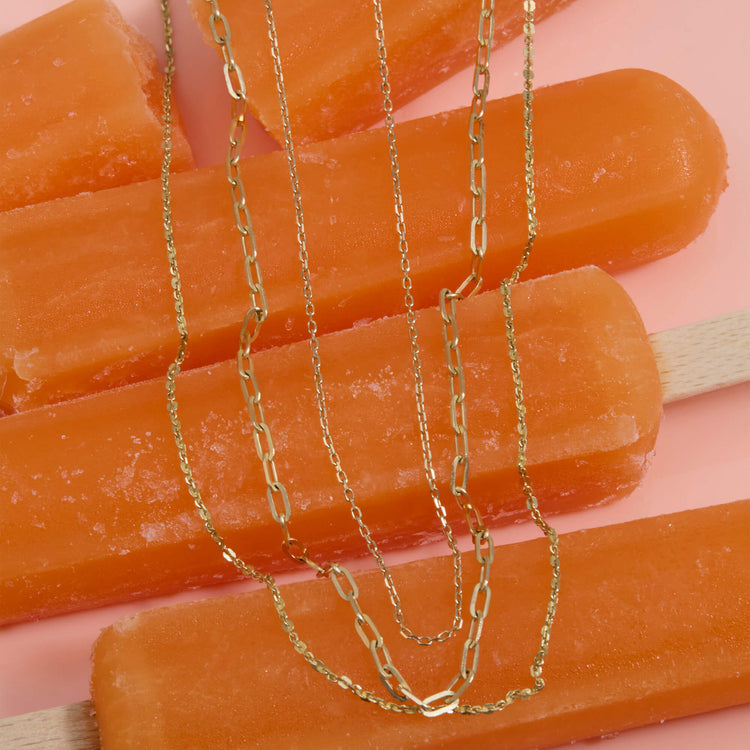 Still life image of Pivot by Stone and Strand 4-Way DC Cable Chain with Stone and Strand solid gold jewelry