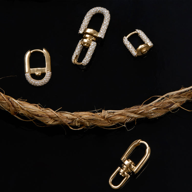 Still life image of Windlass Gold Earrings with Stone and Strand solid gold jewelry