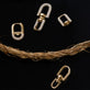 Still life image of Windlass Gold Earrings with Stone and Strand solid gold jewelry