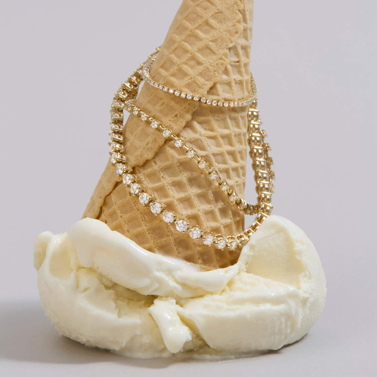 Still life image of 4-5 CTW Lab-Created Tennis Bracelet with Stone and Strand solid gold jewelry