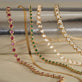 Still life image of Pink Power Bubble Bracelet with Stone and Strand solid gold jewelry