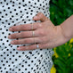 Model wearing Polished in Pearls Ring with solid gold Stone and Strand jewelry