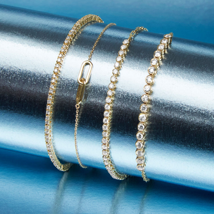 Still life image of Grand Slam Diamond Tennis Bracelet with Stone and Strand solid gold jewelry