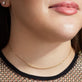 Model wearing Glitter in the Sky Choker with solid gold Stone and Strand jewelry