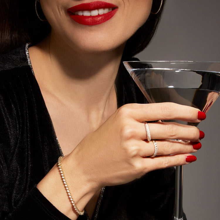 Model wearing 4-5 CTW Lab-Created Tennis Bracelet with solid gold Stone and Strand jewelry