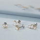 Still life image of Lab-Created Diamond Butterfly Push Pin Flat Back with Stone and Strand solid gold jewelry