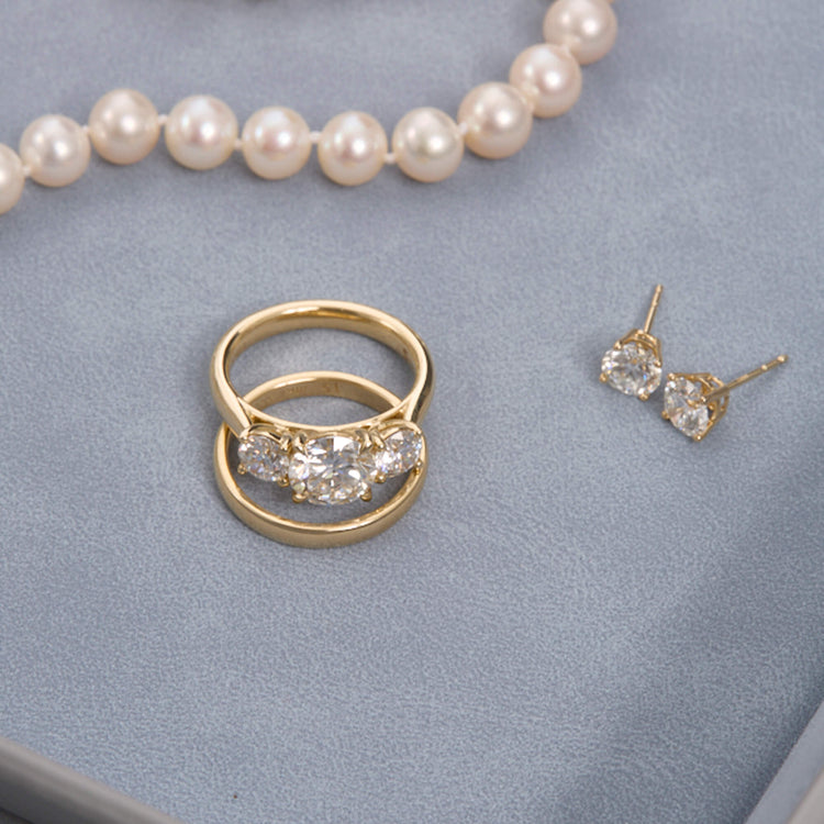 Still life image of Lab-Created Classic Diamond Studs with Stone and Strand solid gold jewelry