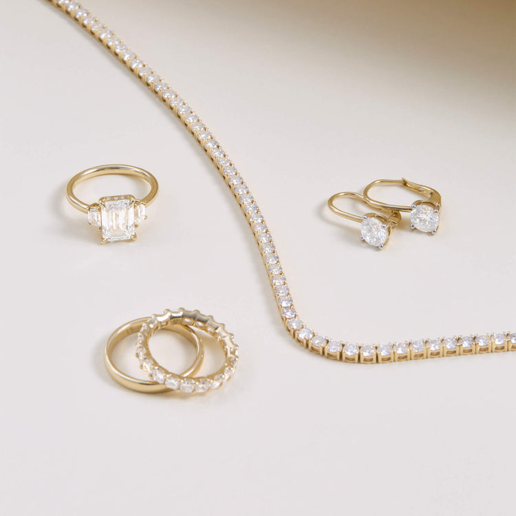 Still life image of LAB-Created Princess Eternity Band with Stone and Strand solid gold jewelry