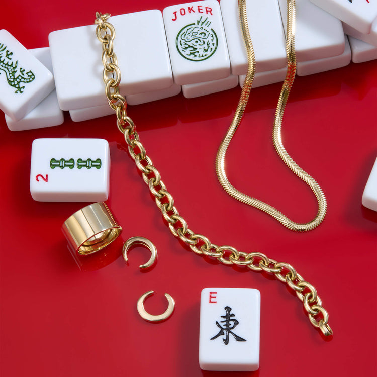 Still life image of Serpentine Necklace with Stone and Strand solid gold jewelry