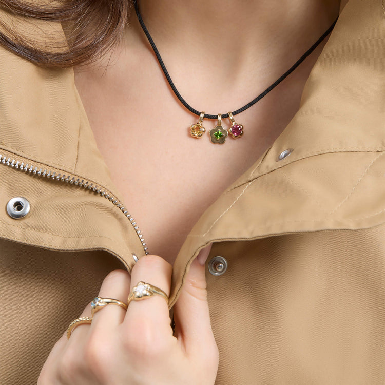 Model wearing LAB-Created Baez Pinky Ring with solid gold Stone and Strand jewelry