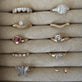 Still life image of The LAB-Created Clio Ring with Stone and Strand solid gold jewelry