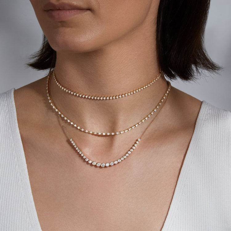 Model wearing Bright Lights Tennis Choker with solid gold Stone and Strand jewelry
