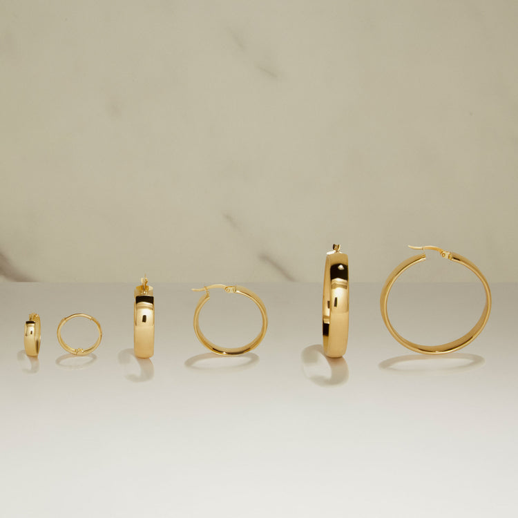 Still life image of Large Gold Glider Hoops with Stone and Strand solid gold jewelry