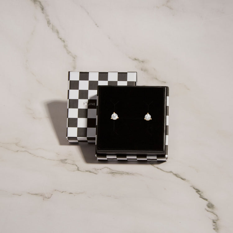 Still life image of Medium Diamond Stud with Stone and Strand gift box