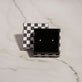 Still life image of Tiny Diamond Stud with Stone and Strand gift box