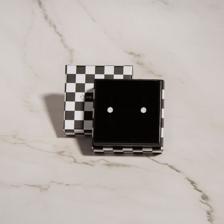 Still life image of Small Diamond Stud with Stone and Strand gift box