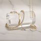 Still life image of Tiny Lab-Created Diamond Looking Glass Necklace with Stone and Strand solid gold jewelry