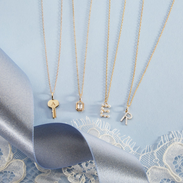 Still life image of Home Sweet Home Necklace with Stone and Strand solid gold jewelry