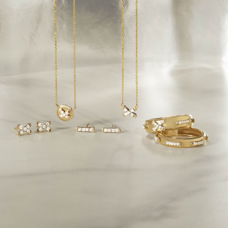 Still life image of Diamond Cross Stitch Studs with Stone and Strand solid gold jewelry