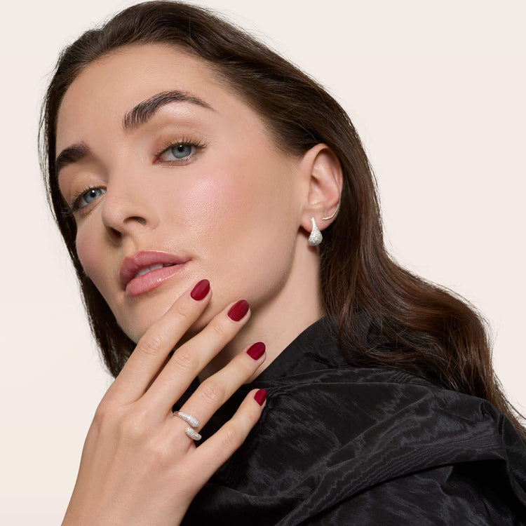 Model wearing Pave Diamond Droplet Studs with solid gold Stone and Strand jewelry