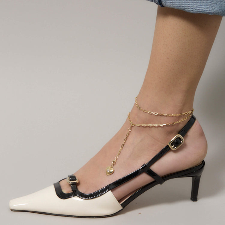 Model wearing Pivot by Stone and Strand Paperclip Chain with solid gold Stone and Strand jewelry