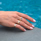 Model wearing Emerald Luxe Pinky Signet Diamond Ring with solid gold Stone and Strand jewelry