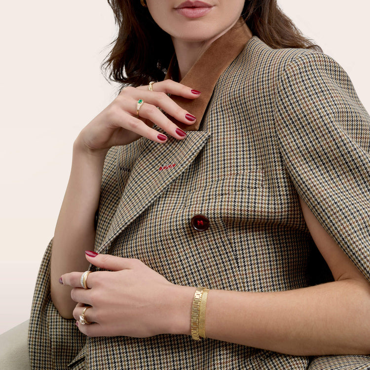 Model wearing Pave Pistachio Dome Ring with solid gold Stone and Strand jewelry
