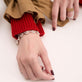 Model wearing Puffed Maritime Silver Bracelet with solid gold Stone and Strand jewelry